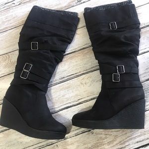 Calf height black wedge boots